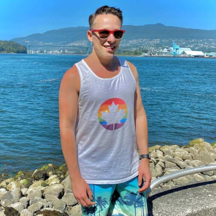 Josh Rimer, a previous Mr Gay Canada, photographed by the sea.